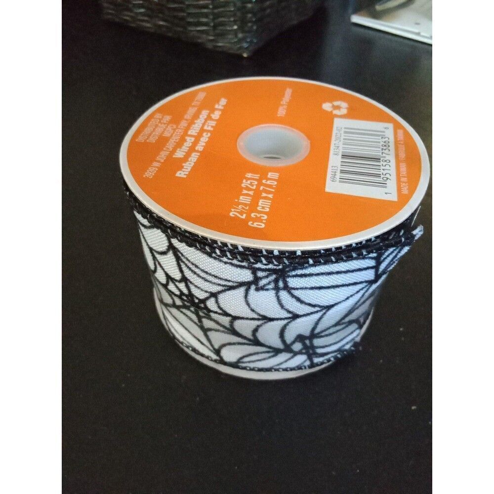 Halloween wired ribbon spiderwebs 25' long black & white